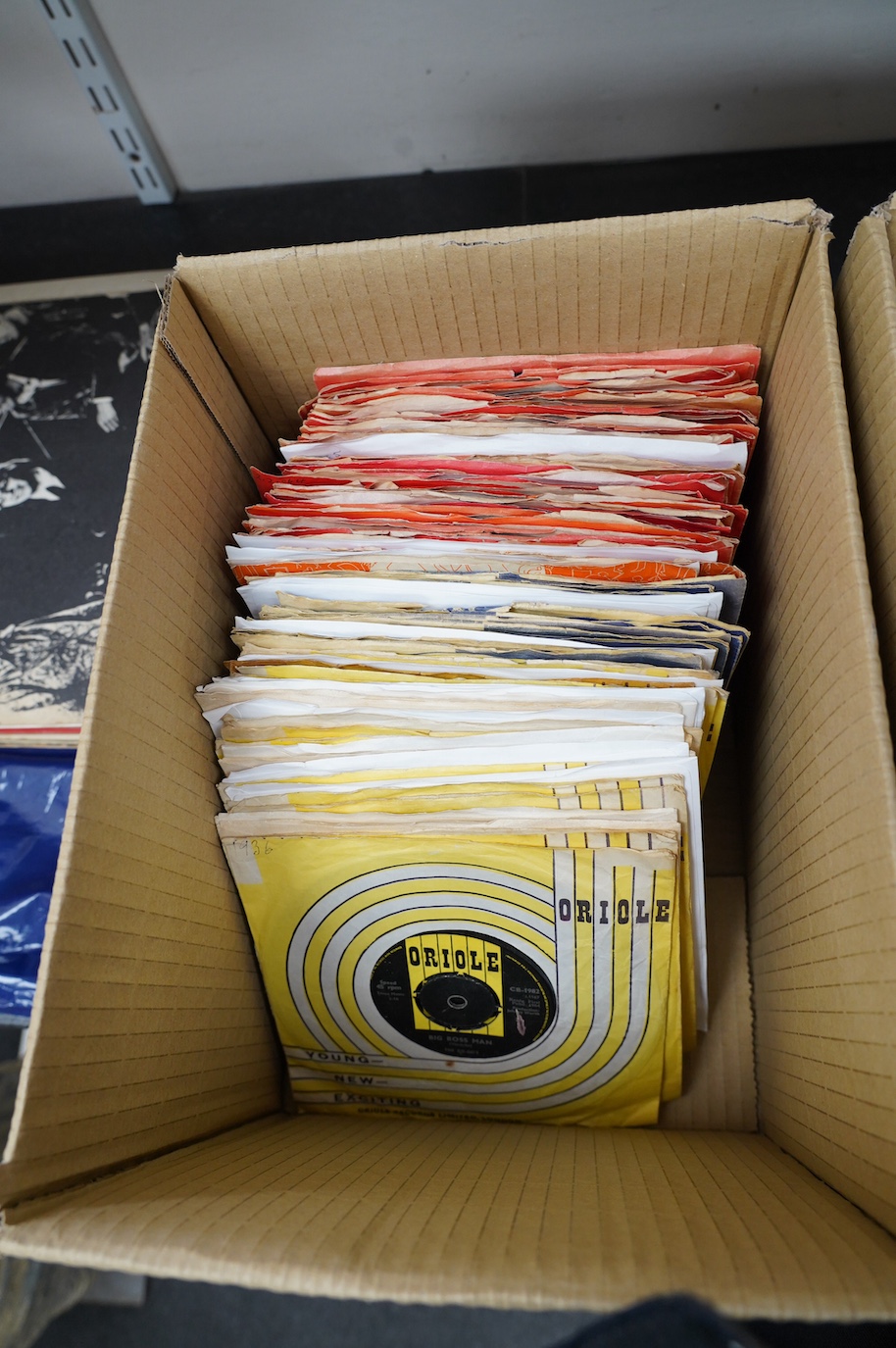 Three boxes of 7” singles on labels including; Oriole, Polydor, Liberty, Piccadilly, Mercury, etc. artists including; The Who, James Brown, the Crickets, Eddie Cochran, The Platters, Big Bopper, Sarah Vaughan, Johnny Pre